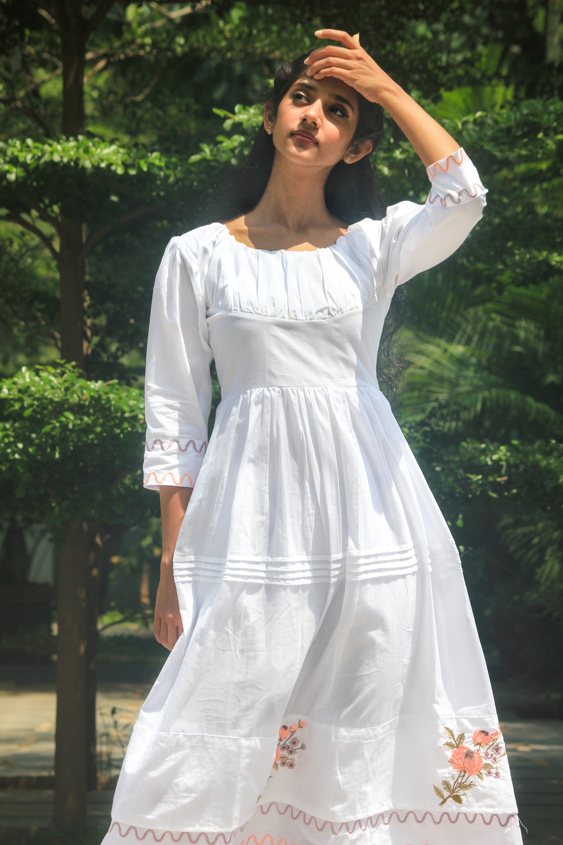 White vacation dress which is playful anf fun.